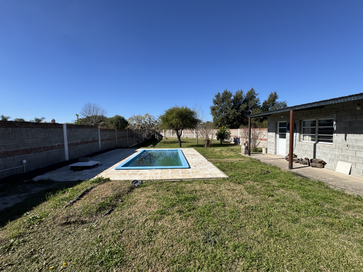 SE VENDE CASA CON AMPLIO TERRENO
